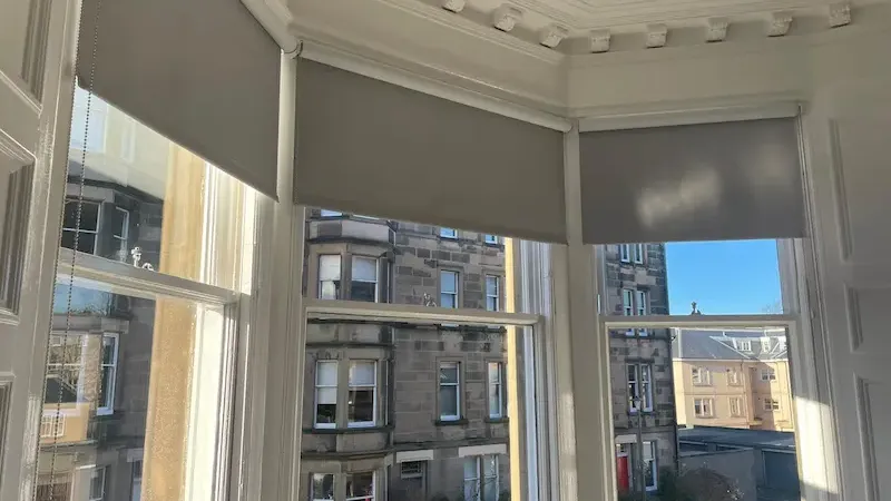 Roller blinds fitted on an Edinburgh bay window