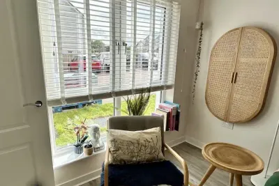 White venetian blinds in a modern living room
